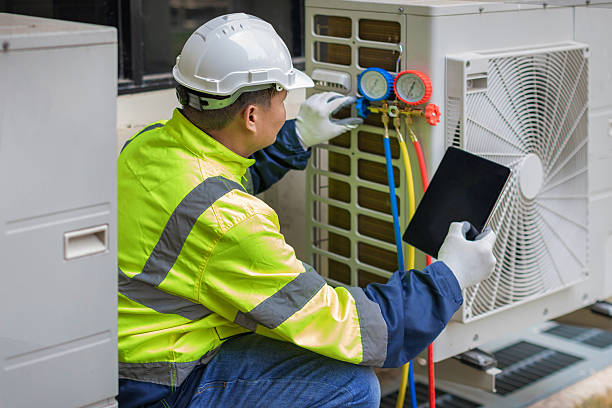 Professional Heat Pump Repair technician working in Lake Hamilton, AR